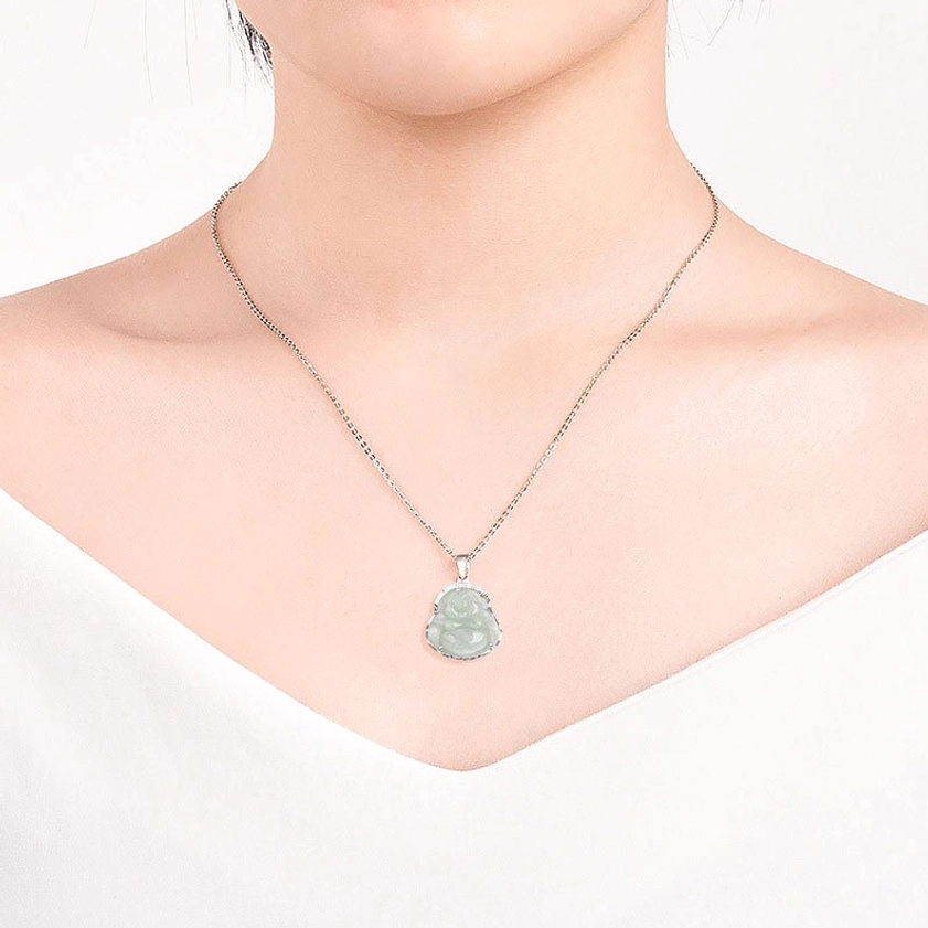 Laughing Buddha jade necklace worn on neck with white V-neck top demonstrating how Buddhist pendant looks when styled