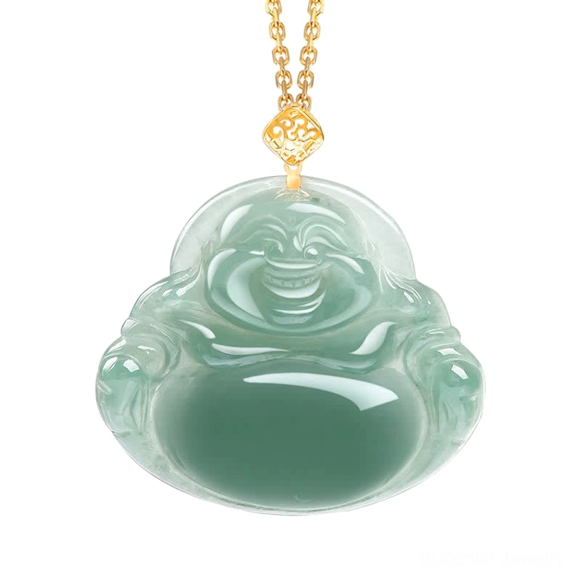Polished teal green jade Laughing Buddha pendant with decorative gold clasp on black fabric with foliage