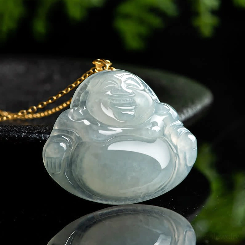 Side angle view of jade Laughing Buddha Buddhist pendant on delicate gold chain, showing carved Buddha face profile
