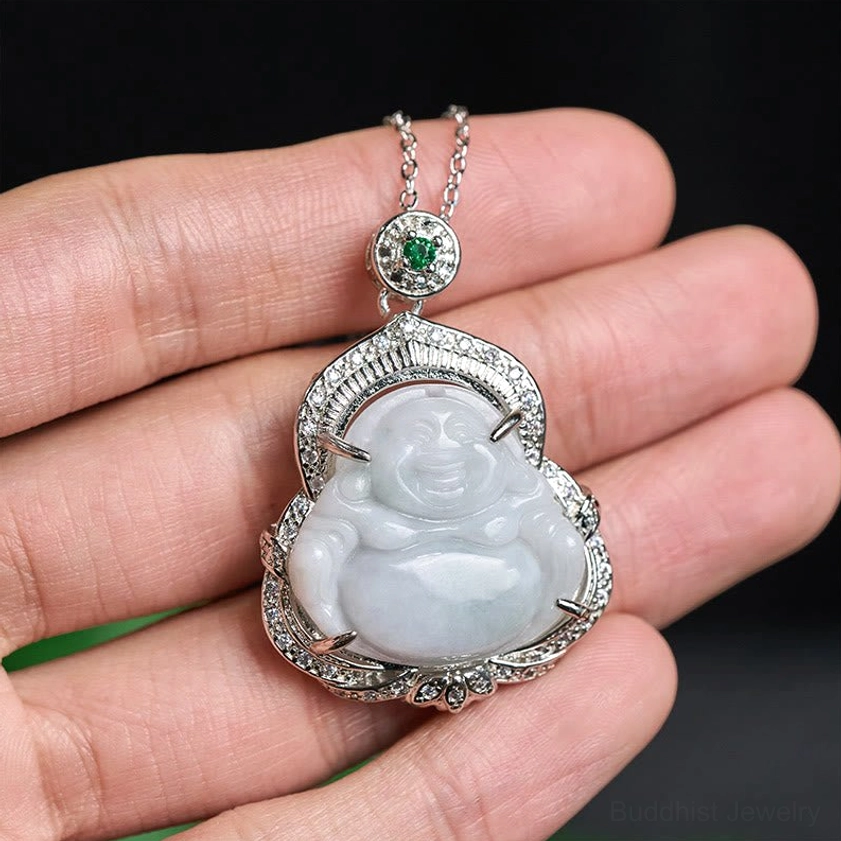 Hand-held Laughing Buddha jade pendant necklace showing actual size and wearable scale with human fingers