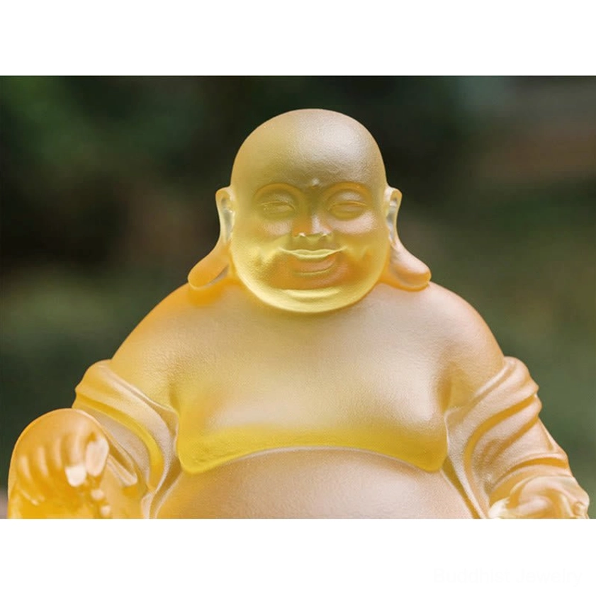 Detailed head close-up of Laughing Buddha Liuli crystal statue showing smiling expression large earlobes amber frosted glass