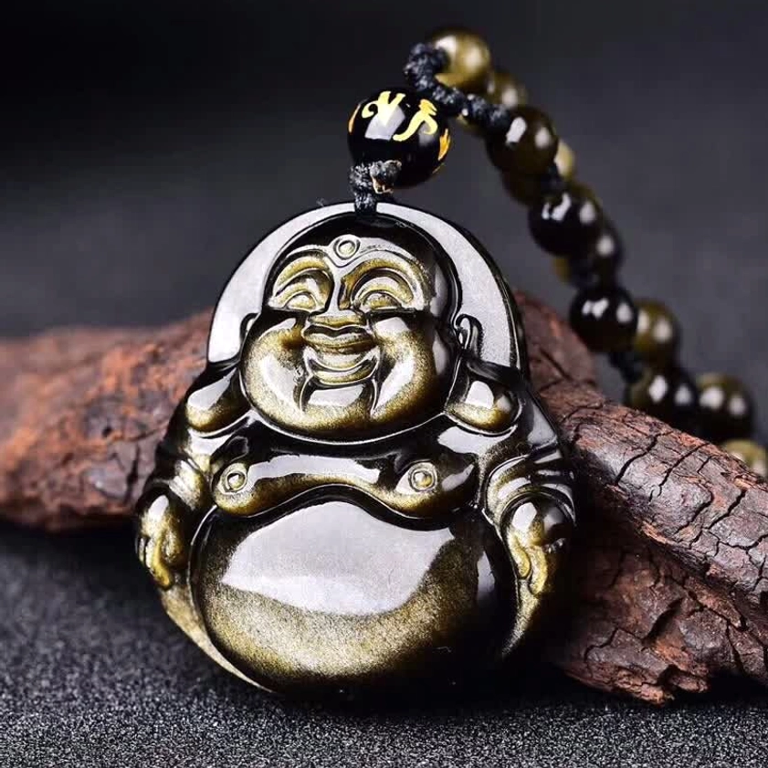 Gold sheen obsidian Laughing Buddha pendant close-up front view showing glossy black stone with golden shimmer and intricate carved Buddha face