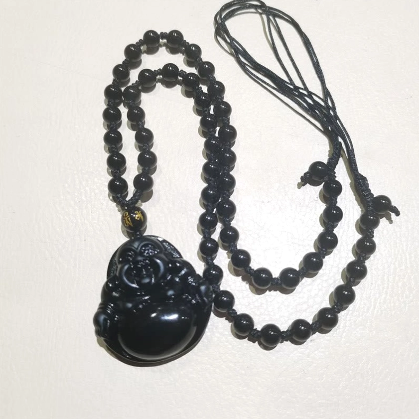 Laughing Buddha necklace pendant lifestyle wear showing spiritual jewelry on model