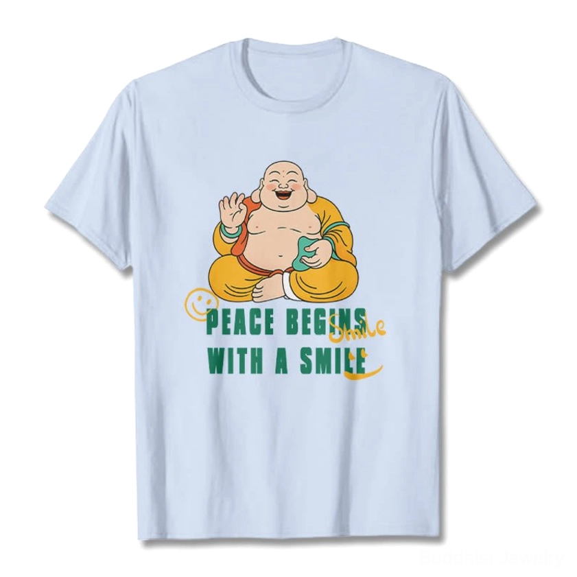 Light cyan Laughing Buddha Peace Begins With A Smile graphic t-shirt front flat lay view