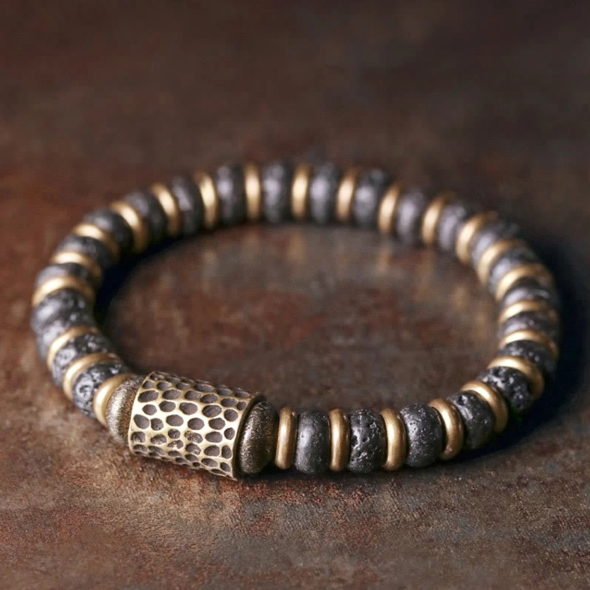 Lava rock copper bracelet top view showing hand-hammered copper accents and natural volcanic stone beads