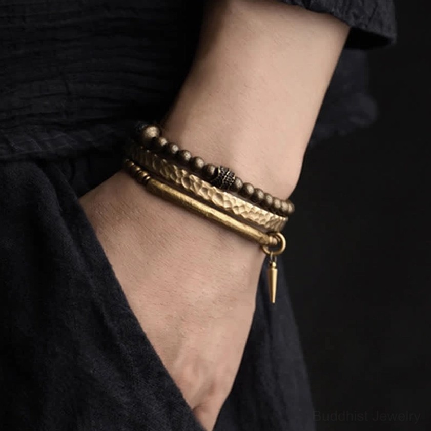Lava rock copper balance cuff bracelet and beaded strand worn on wrist back view close-up