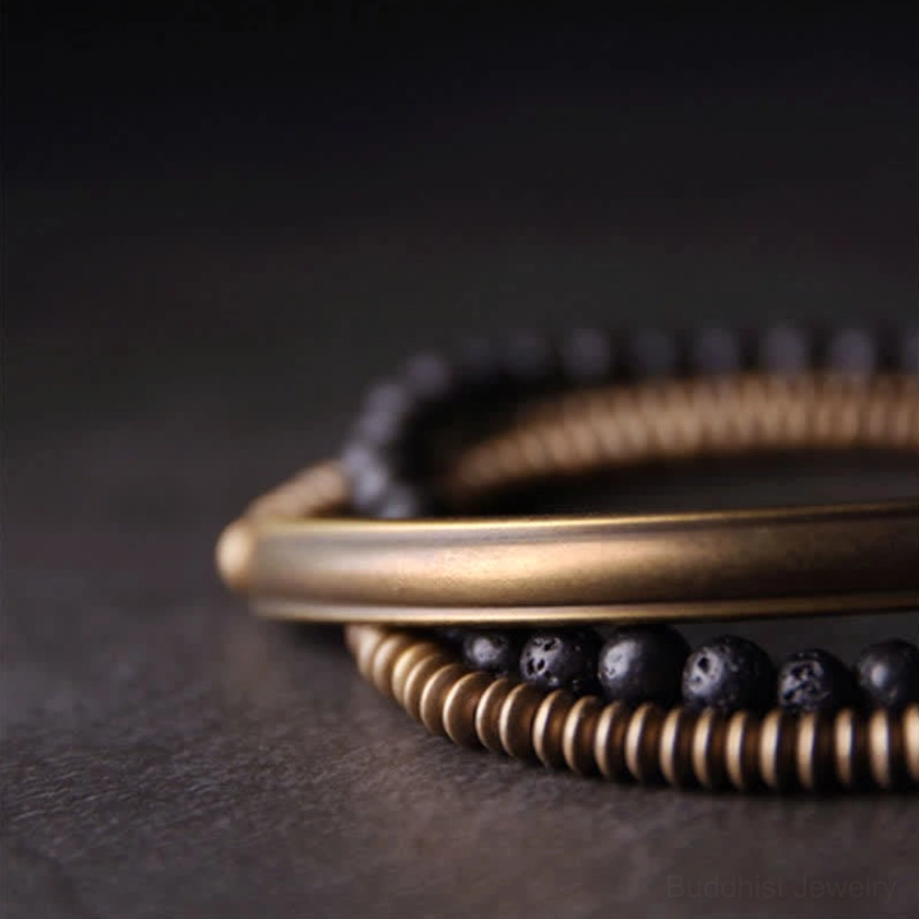Meditation and mindfulness lava rock copper bracelet worn on wrist for stress relief and spiritual grounding practice
