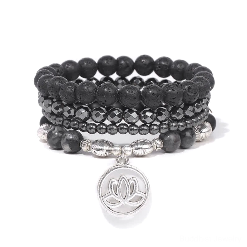 Lava rock lotus bracelet set with silver lotus charm displayed on white background - top view