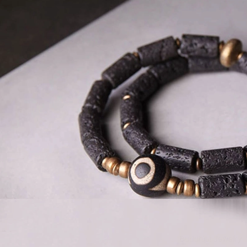 Two-layer stacked lava rock Buddhist bracelet with three-eye Dzi bead and brass hardware