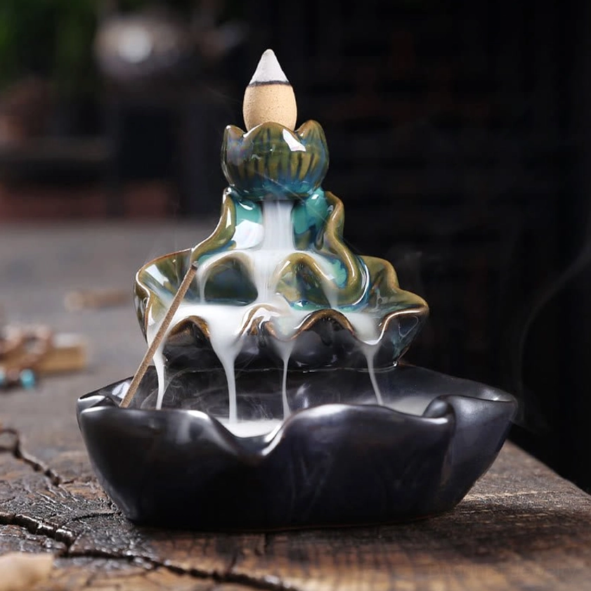 Multi-layer lotus incense burner design with flowing incense smoke