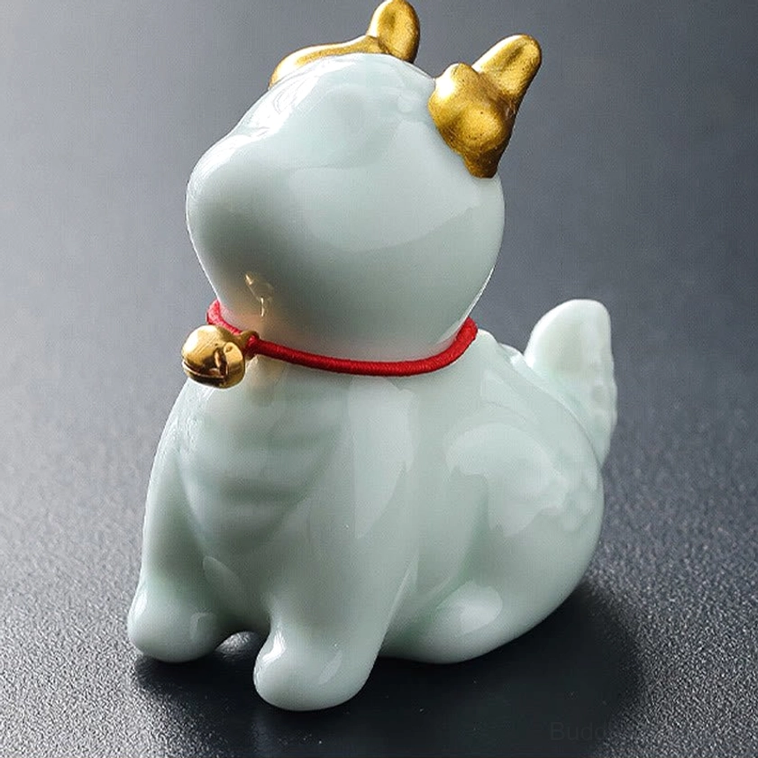 Light blue dragon bell incense burner compact size front view with celadon glaze finish