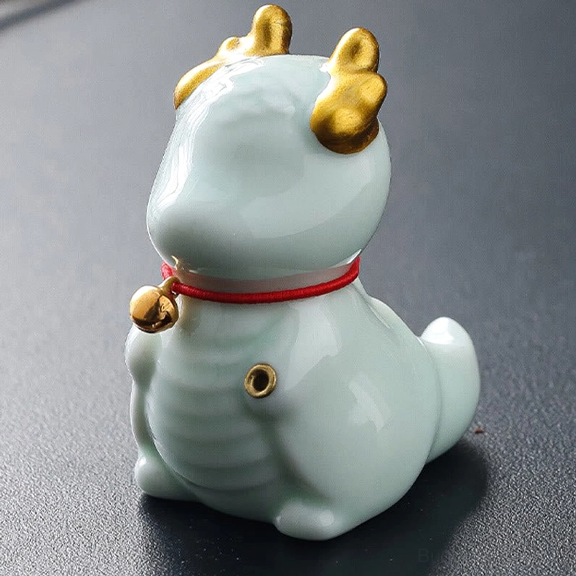 Light blue dragon bell ceramic incense holder compact size showing complete design with golden horns