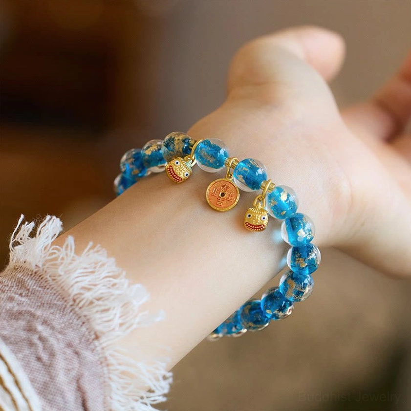 Light blue liuli glass bead Buddhist wealth bracelet with gold pixiu charm for career growth and abundance