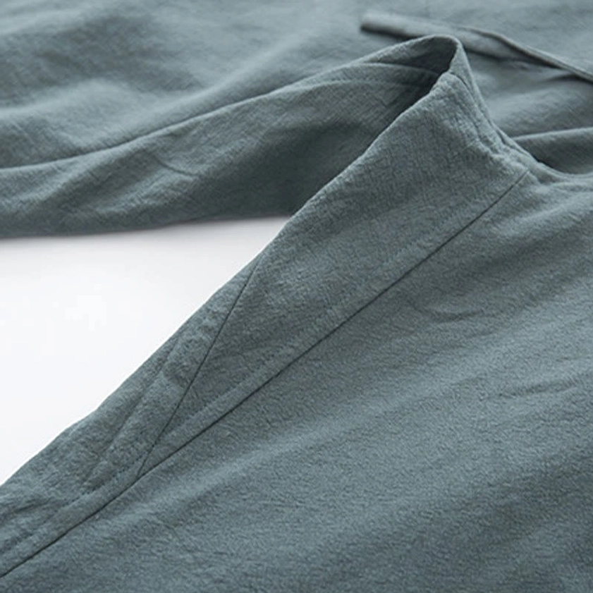 Drawstring waist detail of light cyan zen tang suit pants designed for comfort during meditation and yoga