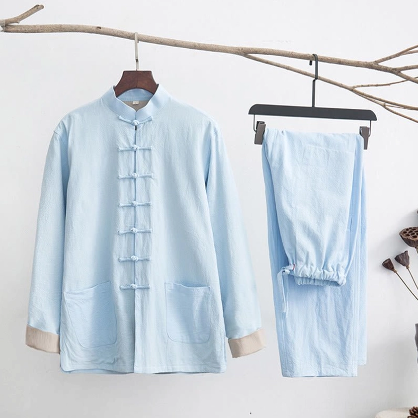 Light cyan zen tang suit two-piece set hanging display with traditional frog buttons and elastic waist design