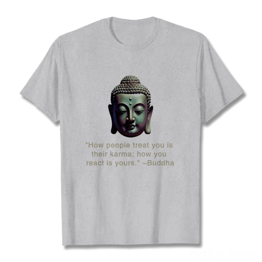 Light grey Buddha karma quote t-shirt flat lay showing neutral color and crew neck design