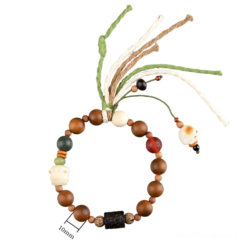 Lightning strike wood bodhi seed bracelet with cat paw protection charm on wrist, worn lifestyle photograph