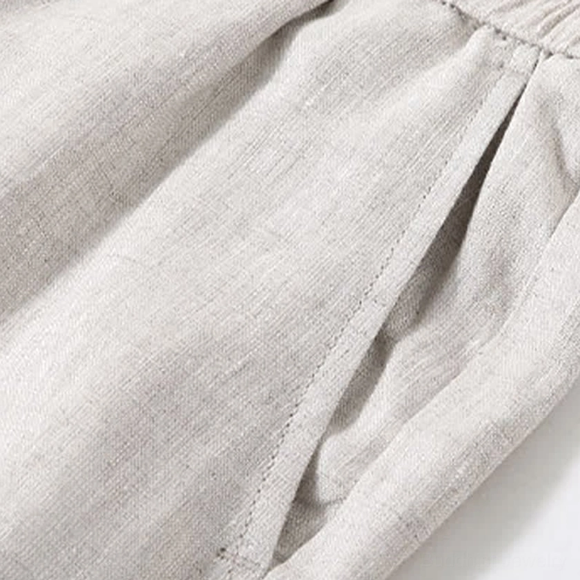 Natural linen fabric texture close-up - showing authentic wrinkled weave and breathable material for meditation practice