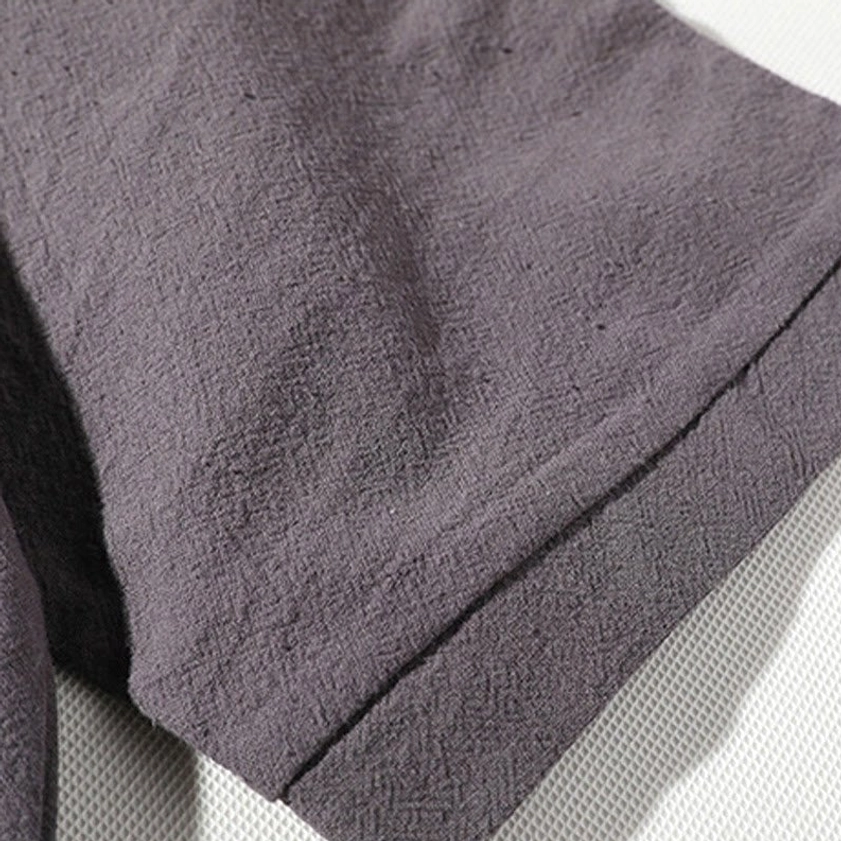Premium linen-like polyester fabric texture - wrinkled finish showing quality weave of meditation set