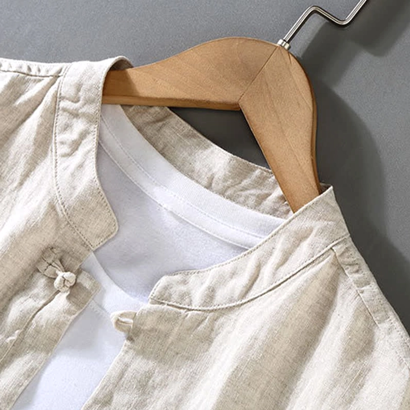 Close-up of linen shirt with traditional mandarin collar and Chinese frog button details