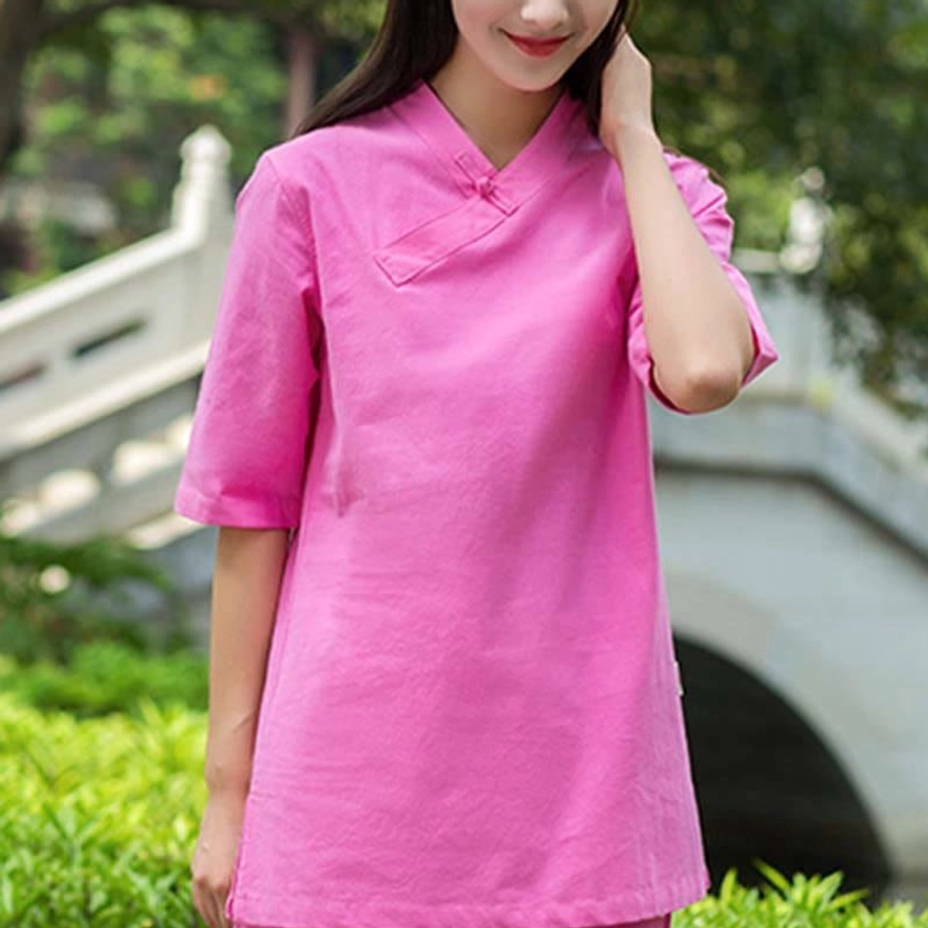 Woman wearing linen Tai Chi and meditation set demonstrating full range of motion and comfortable fit for spiritual practice
