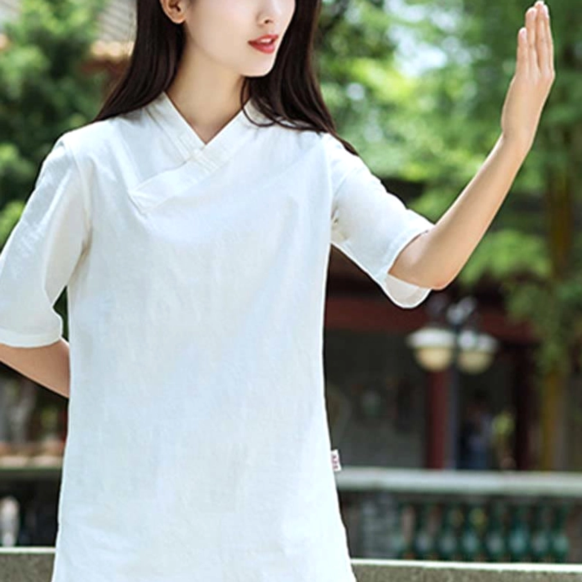 White linen half-sleeve meditation and Tai Chi top with cross collar loose fit design for unrestricted movement