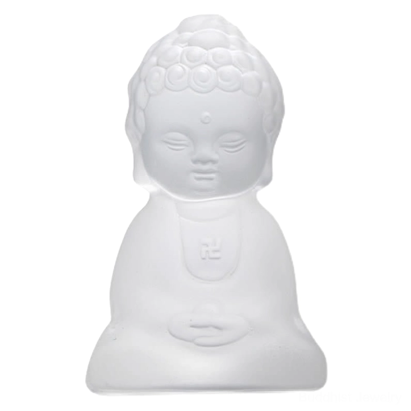 Extreme close-up of hand-crafted Liuli Buddha statue showing detailed facial and chest carvings