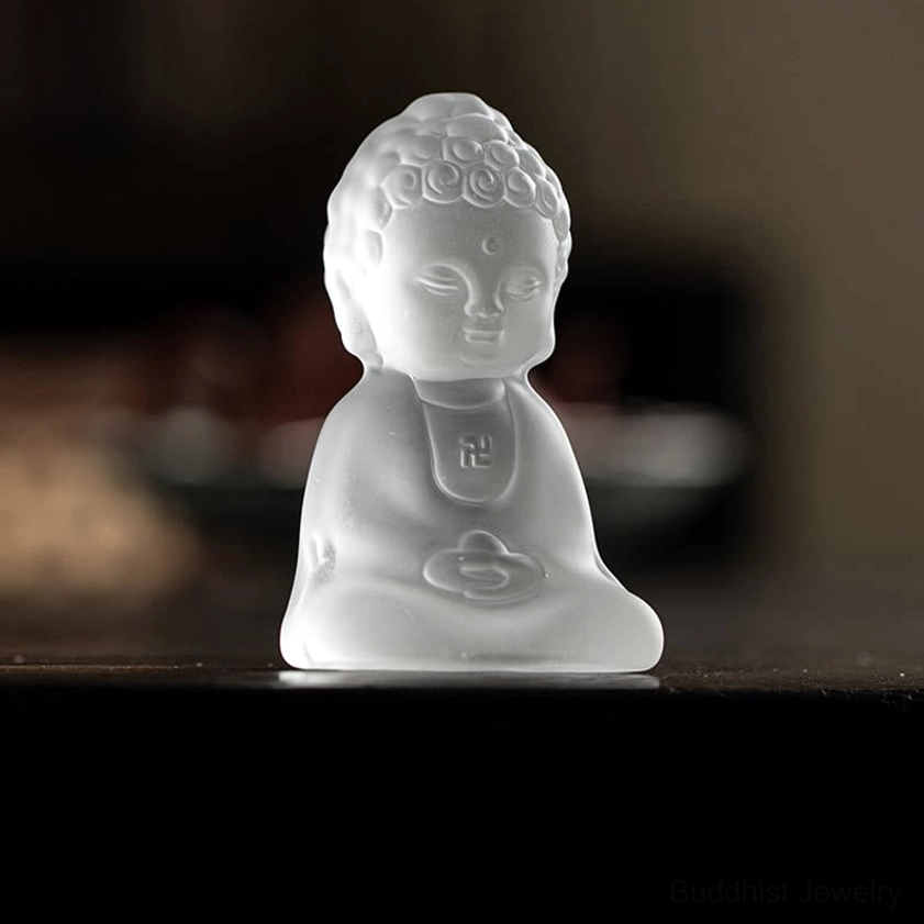 Liuli Buddha glass statue with translucent frosted finish and symbolic chest markings