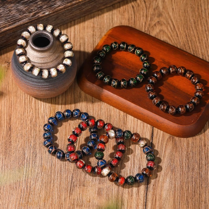 Liuli glass Buddhist meditation bracelet detailed view showing handcrafted bead work and premium elastic string