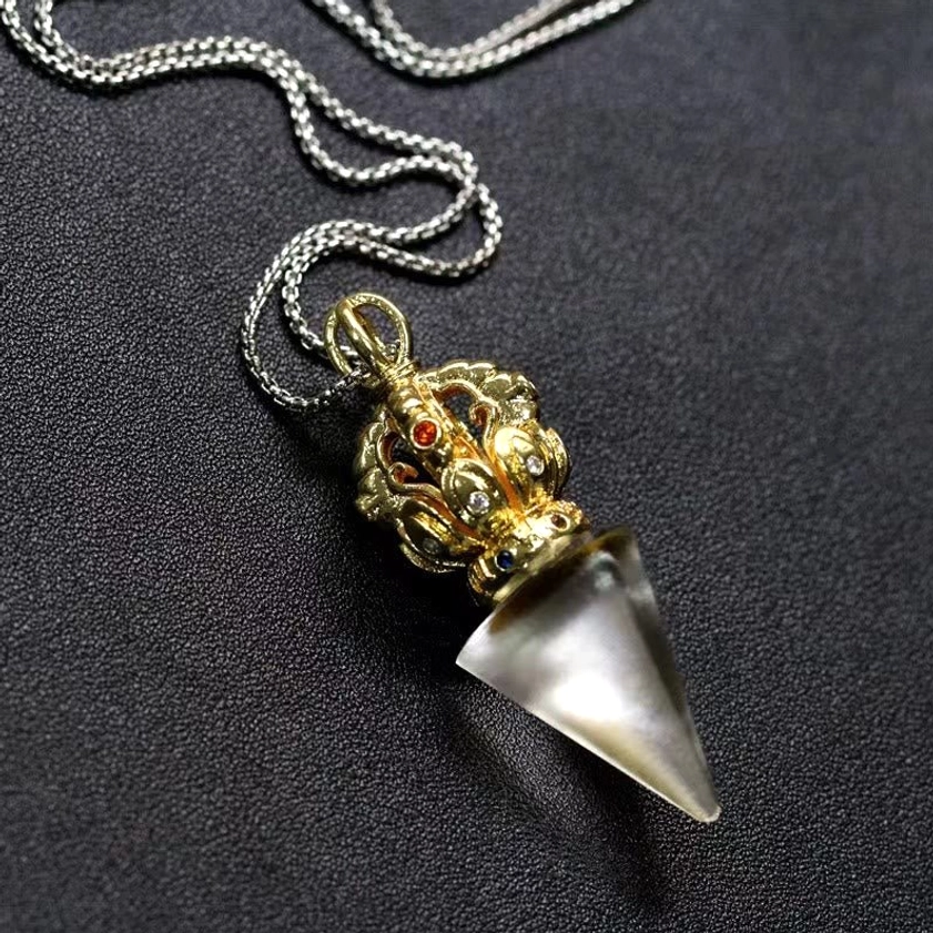 Liuli crystal Dorje pendant detail - handcrafted pâte de verre with authentic Buddhist vajra symbolism