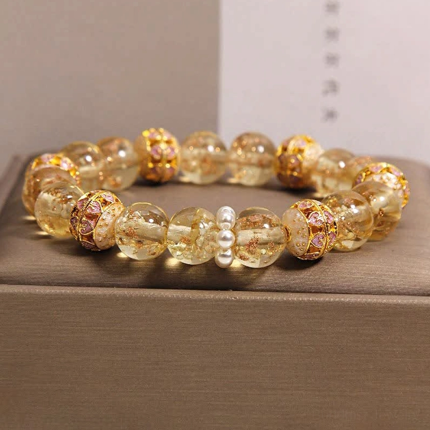 Gold Liuli glass Buddhist bracelet with cloisonné enamel beads and pearl accents displayed in luxury gift box