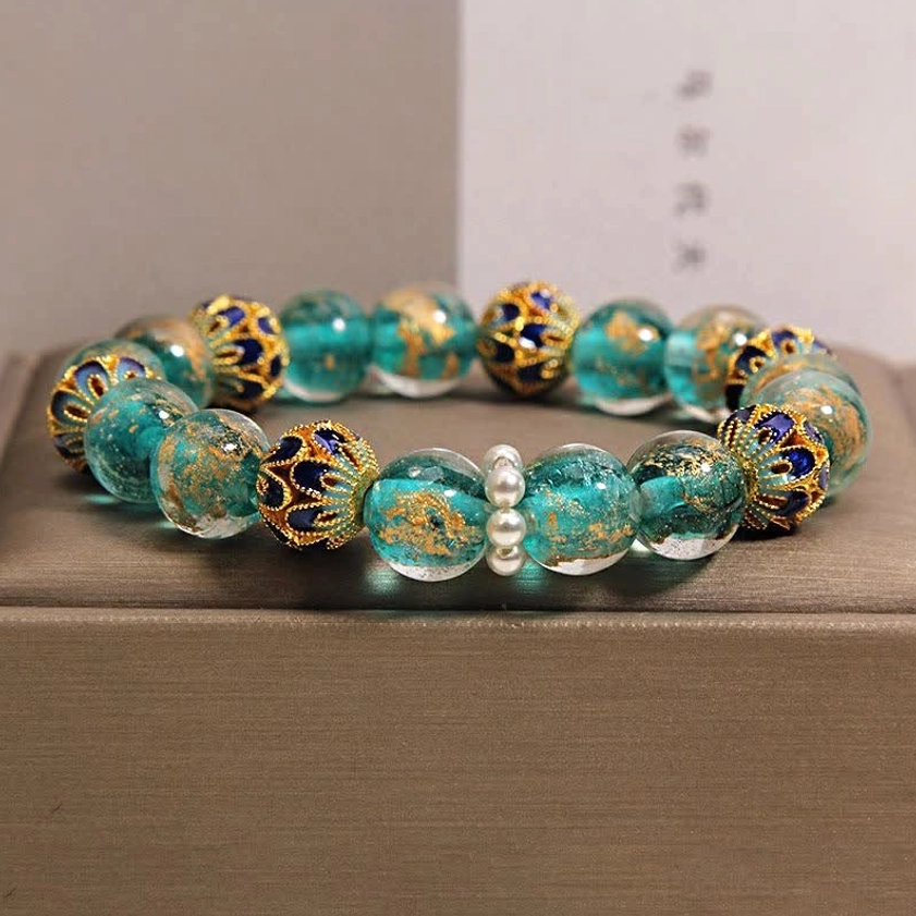 Teal Liuli glass cloisonné Buddhist bracelet with gold leaf enamel beads and white pearl spacers in jewelry box
