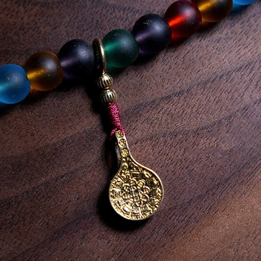 Liuli glass mala beads bracelet featuring Five Elements colors, spiritual meditation tool for Buddhist practice and mindfulness