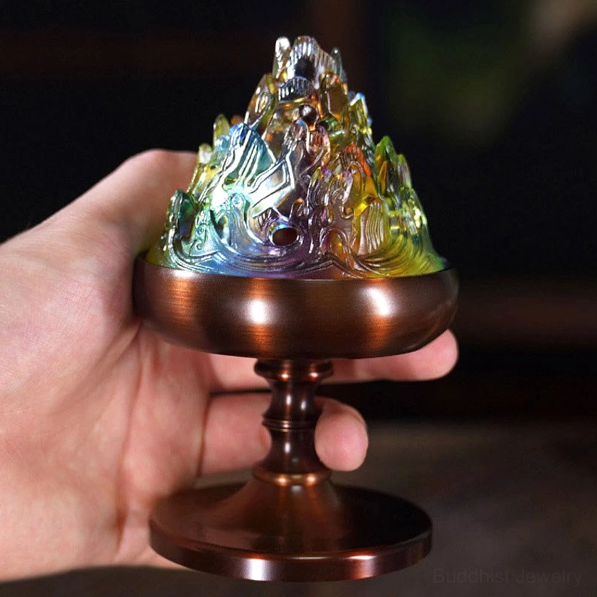 Handheld Liuli crystal incense burner showing bronze metal frame and colorful glass mountain design