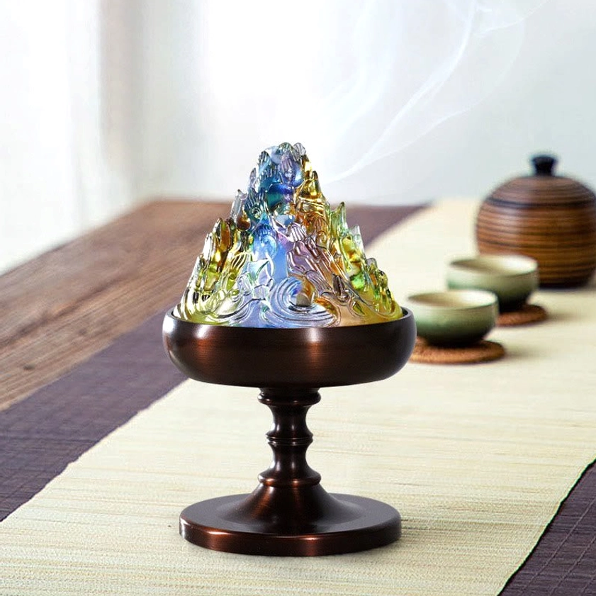 Handcrafted Liuli incense burner displayed on traditional tea table with bronze stand and smoking glass mountain top