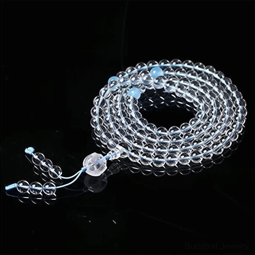 Liuli lotus 108 prayer mala with blue beads, crystal guru bead and tassel, angled top-down display