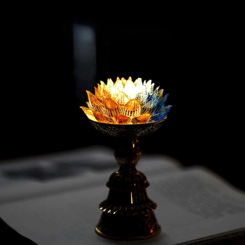 Liuli lotus lamp translucent petals showing fire-kissed ancient glass technique