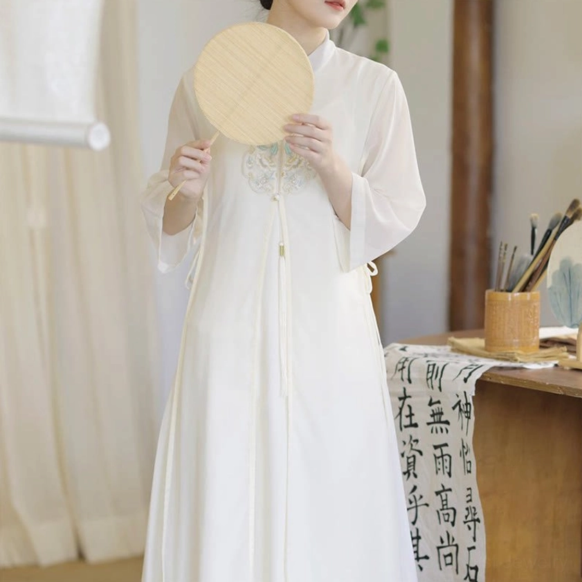 Long white chiffon meditation dress with sheer three-quarter sleeves and tassel details, full front view displaying traditional Zen style