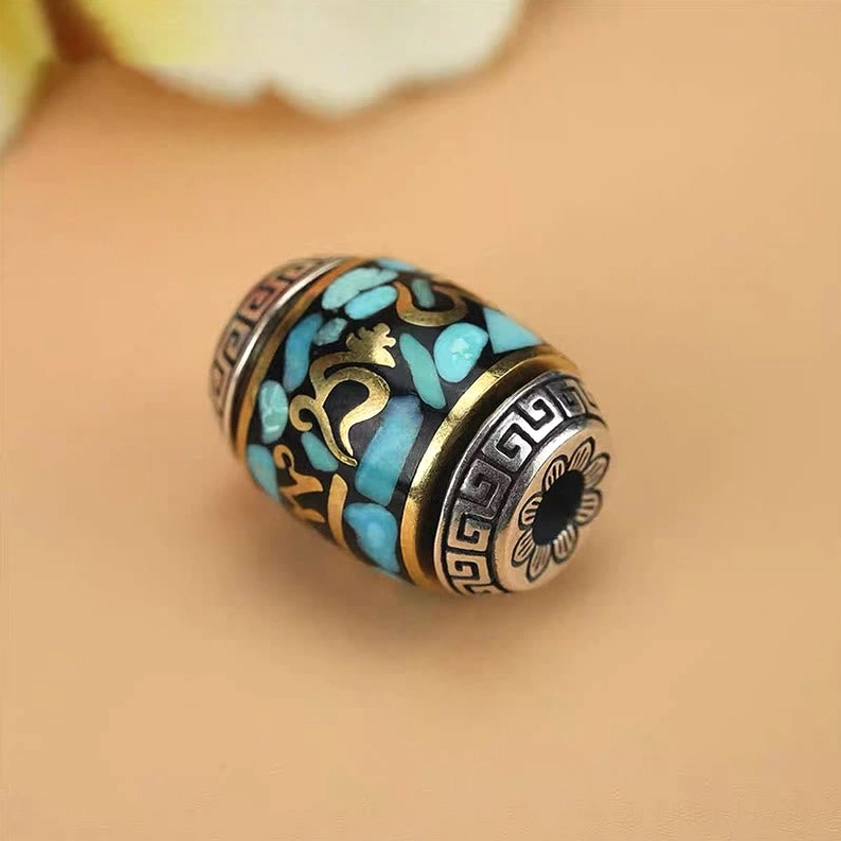 Loose Dzi Bead pendant showing hand-painted nine-eye pattern and geometric Buddhist design
