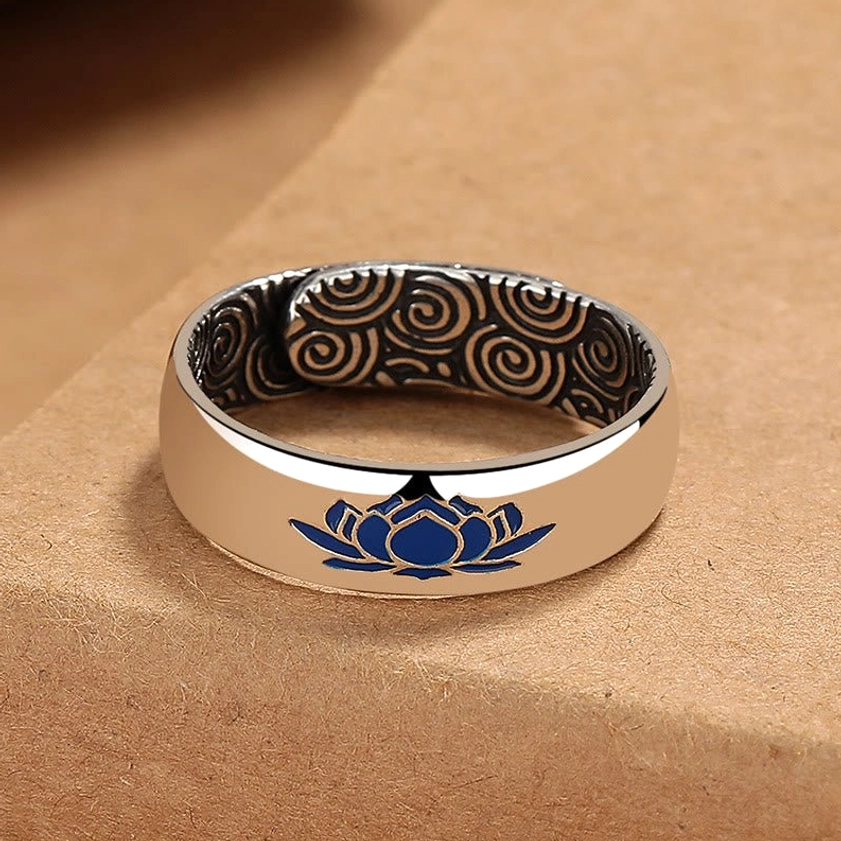 Buddhist blue lotus ring front overhead view with polished copper finish and inner dark cloud carving