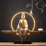 Lotus Avalokitesvara White ceramic backflow incense burner with LED halo, wooden base, and lotus incense tray on display table