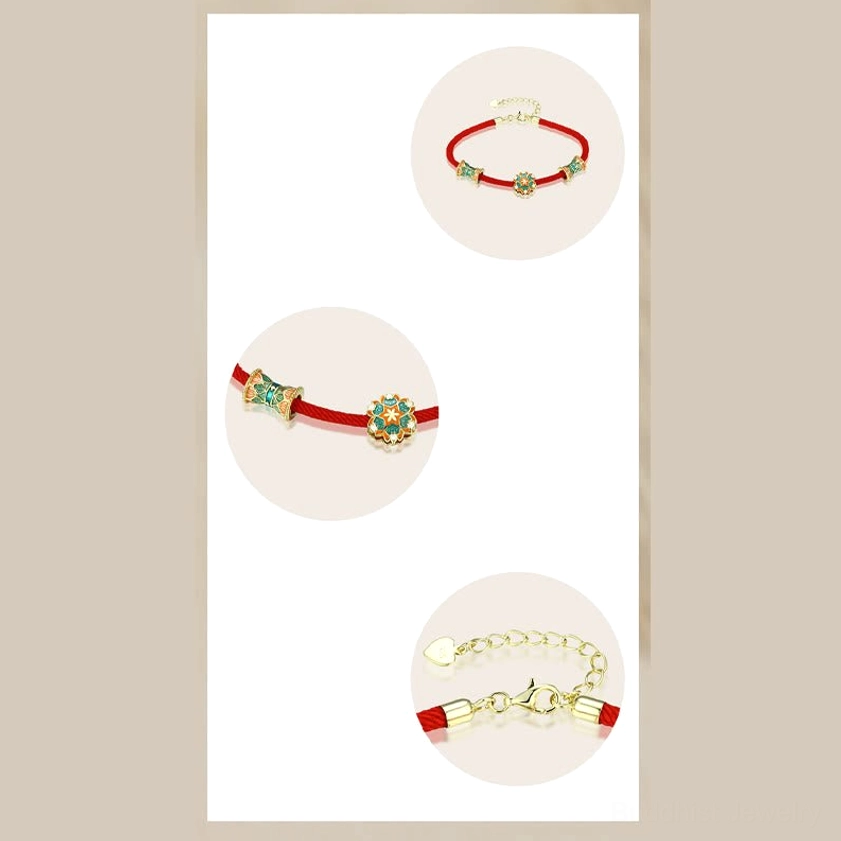 Worn on wrist lifestyle shot of lotus drum red string bracelet showing protection charm in daily wear