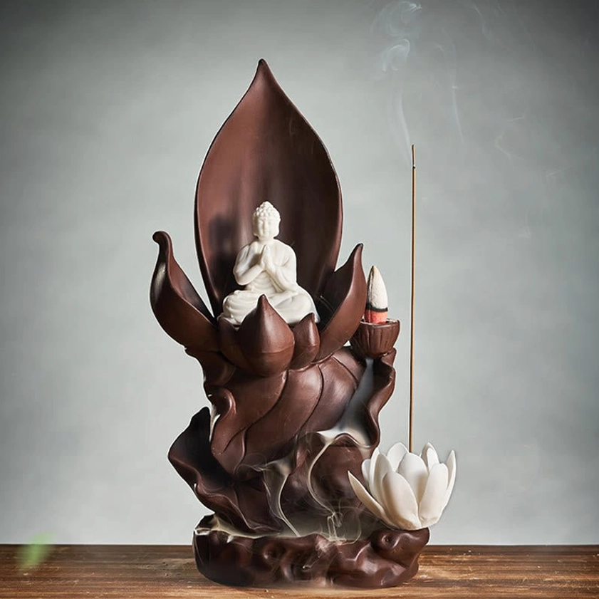 Buddhist lotus incense holder featuring white porcelain lotus flower ornament with purple clay base