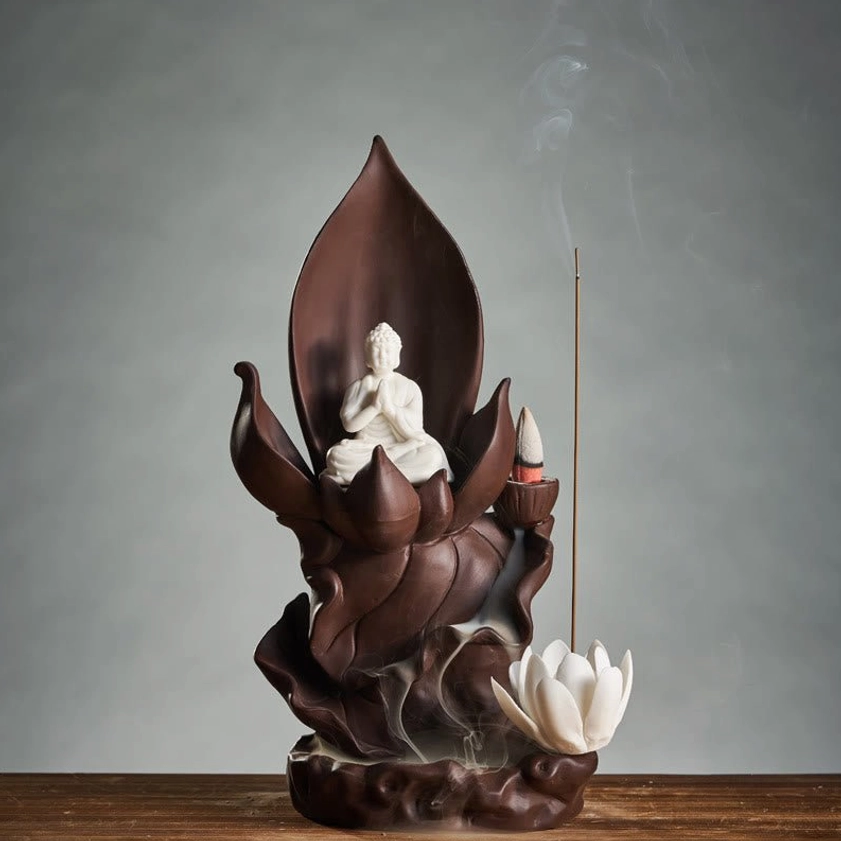 Handcrafted purple clay Buddha meditation incense burner showing subtle backflow smoke cascading effect