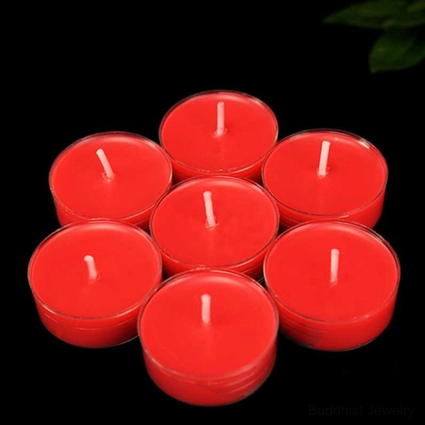 Single lotus candle holder positioned on meditation altar with soft candlelight creating serene spiritual atmosphere for yoga and prayer