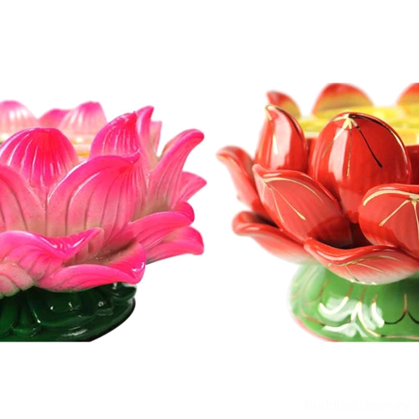 Lotus candle holder with vegetable oil tealights burning during meditation and prayer ritual practice session for inner peace