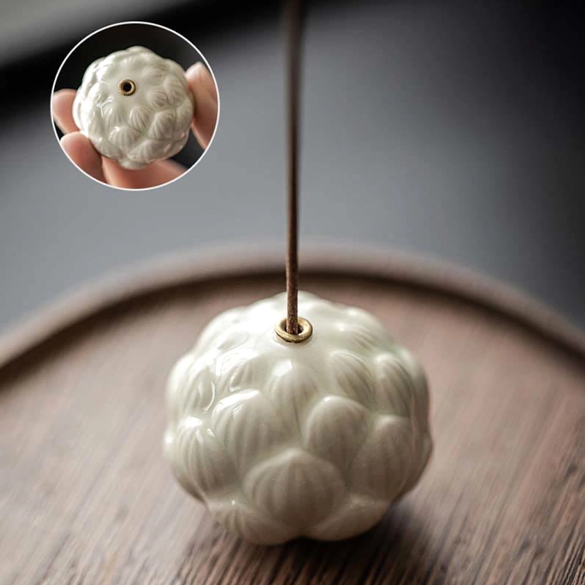 White ceramic lotus incense burner handcrafted for Buddhist meditation and mindfulness practices