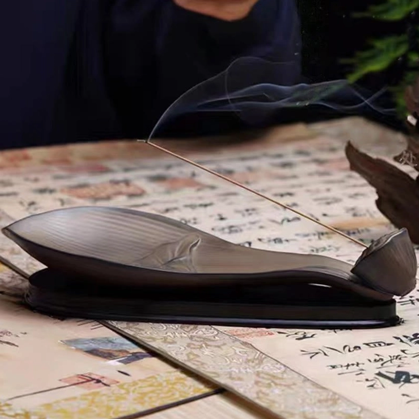 Natural brown ceramic lotus incense burner showing texture and color variation of handcrafted piece