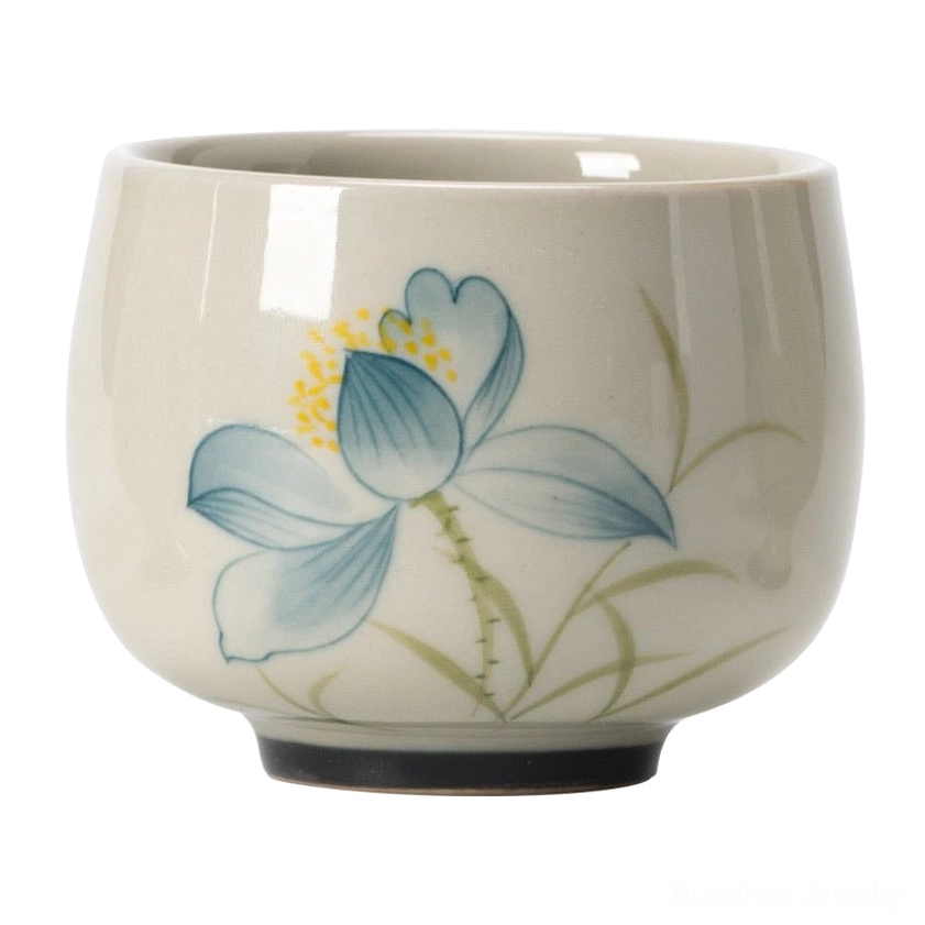 Full front view of round hand-painted ceramic lotus tea cup with complete blue flower design on neutral background