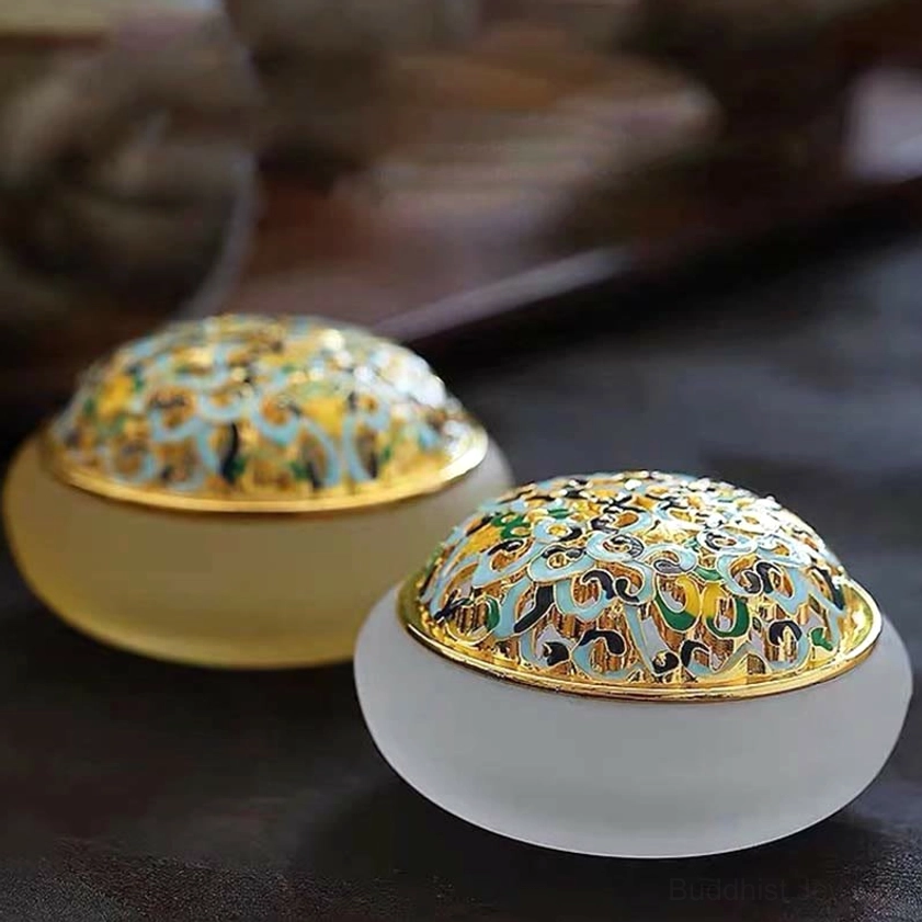 Lotus crystal incense burner with incense cone in use during meditation practice